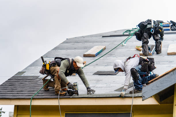 Professional Gutter Installation technician working in Visalia, CA